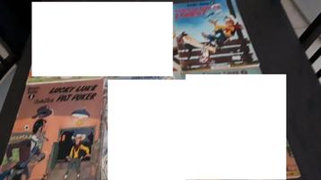 Veel van 12 Lucky Luke paperbacks