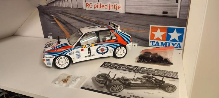 Tamiya Lancia Delta nieuw, Hobby en Vrije tijd, Modelbouw | Radiografisch | Auto's, Zo goed als nieuw, Ophalen of Verzenden
