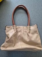 Handtas, Ophalen, Handtas