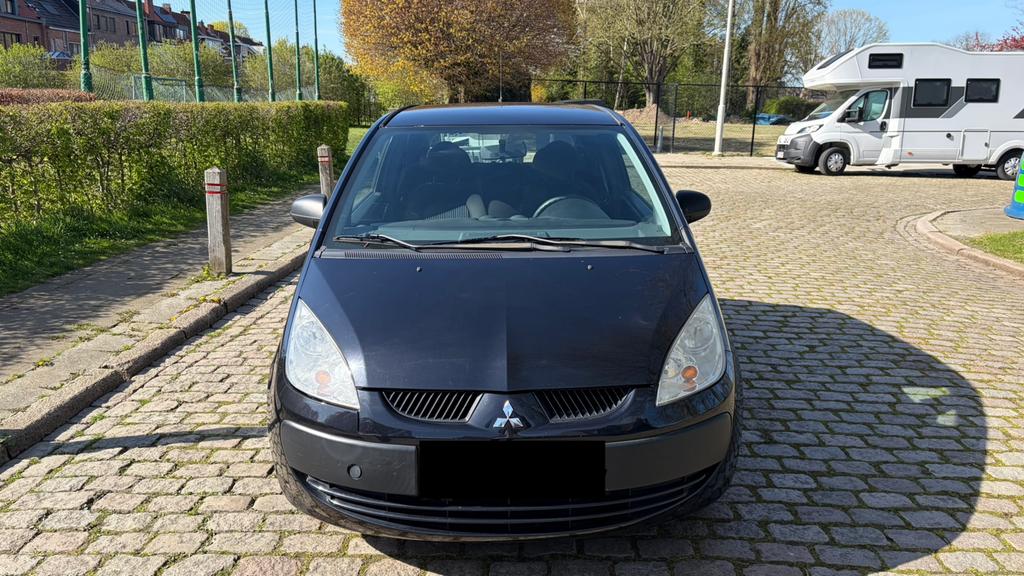 Mitsubishi Colt 1.1 Benzine | 146.700 km, Auto's, Mitsubishi, Voorwielaandrijving, Stof, Zwart, Handgeschakeld