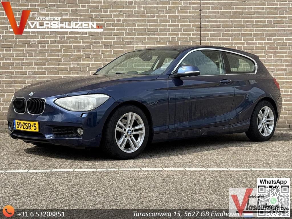 BMW 114 1-serie 114i EDE Business+ | Leder | Climate | Navi, Auto's, 1 Reeks, Blauw, 124 g/km, Cruise Control