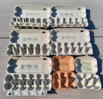 20-tal grote kartonnen eierdozen beschikbaar voor biedingen