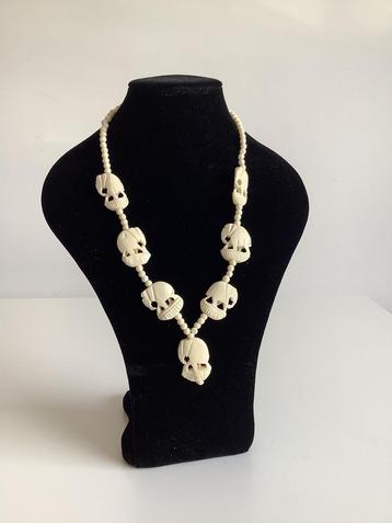 Vintage celluloid ketting met olifantjes beschikbaar voor biedingen