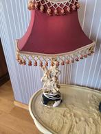 Lamp met ivoren voet, Ophalen