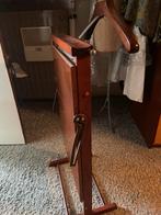 Kapstok broekenpers, Ophalen