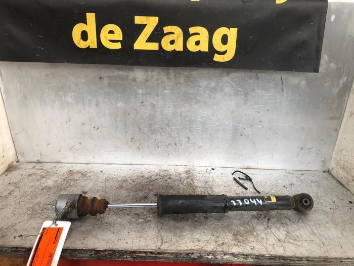 Schokdemper links-achter van een Volkswagen Polo, Auto-onderdelen, Ophanging en Onderstel, Volkswagen, Gebruikt, 3 maanden garantie