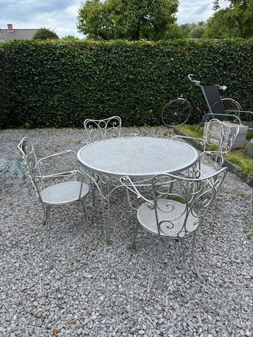 Smeedijzeren tuinset met 4 stoelen beschikbaar voor biedingen