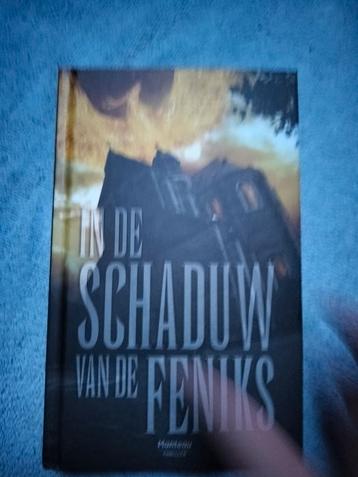 Boek In de Schaduw van de Feniks beschikbaar voor biedingen