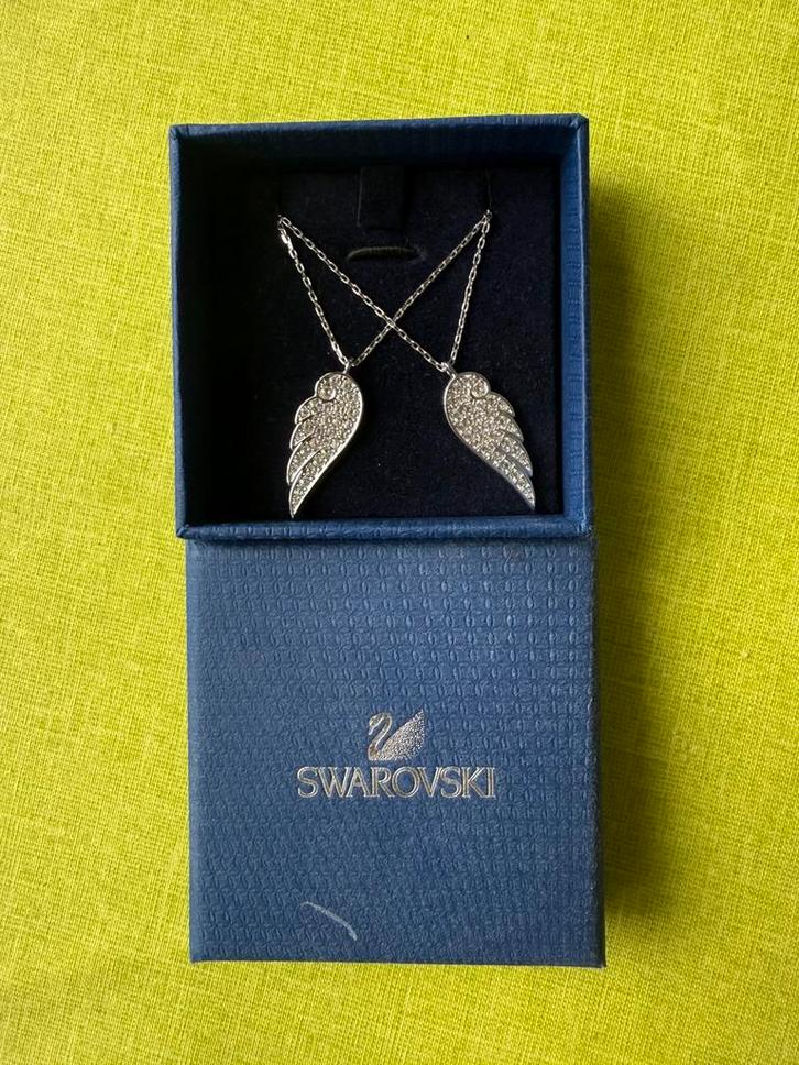 Swarovski Duo Colliers Wings Set, Handtassen en Accessoires, Kettingen, Zo goed als nieuw, Steen of Mineraal, Zilver, Met kristal