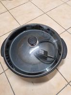 Paellapan op stroom, Ophalen