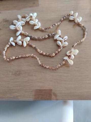 Schelpen ketting, Enlèvement, Comme neuf