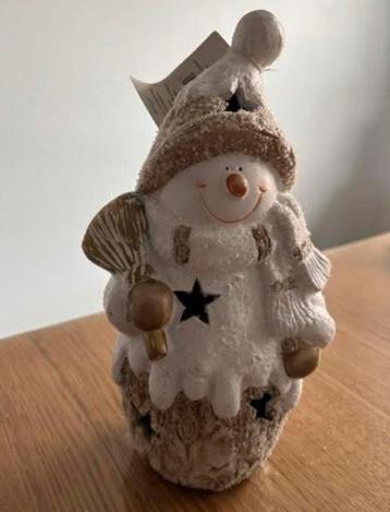 Beeld sneeuwpop beschikbaar voor biedingen
