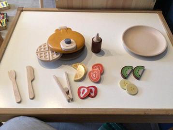 Houten wafelijzer beschikbaar voor biedingen