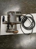 Zware bovenfrees, Enlèvement, Routeur