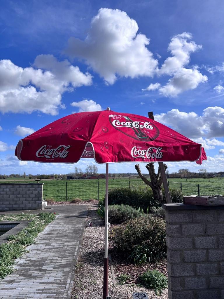 Coca Cola parasol, Ophalen