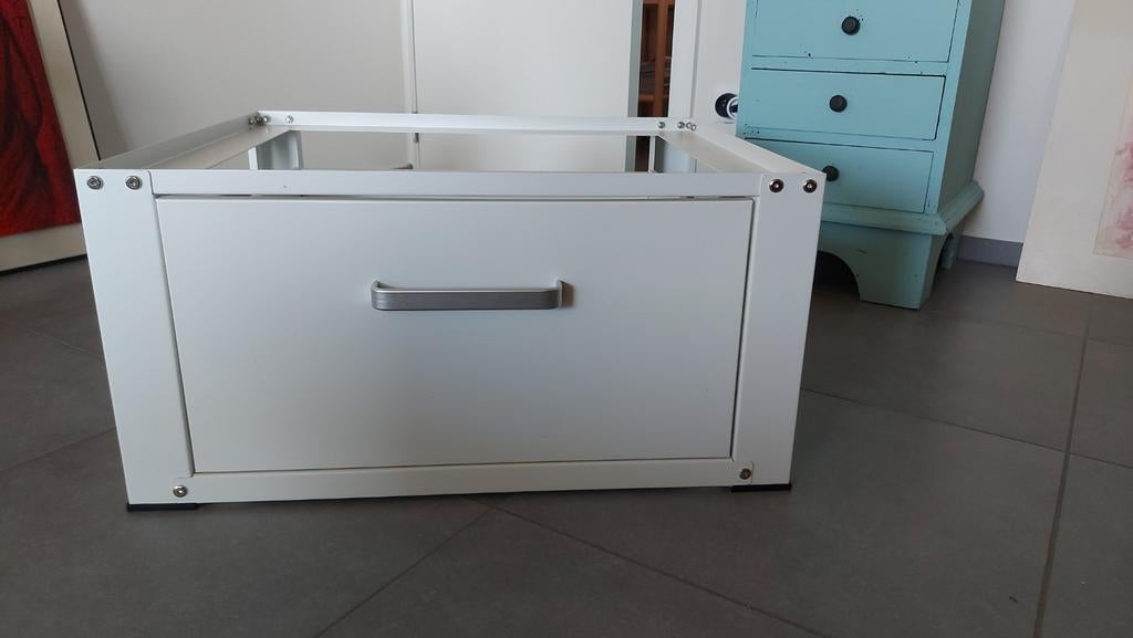 Sokkel voor wasmachine, Ophalen