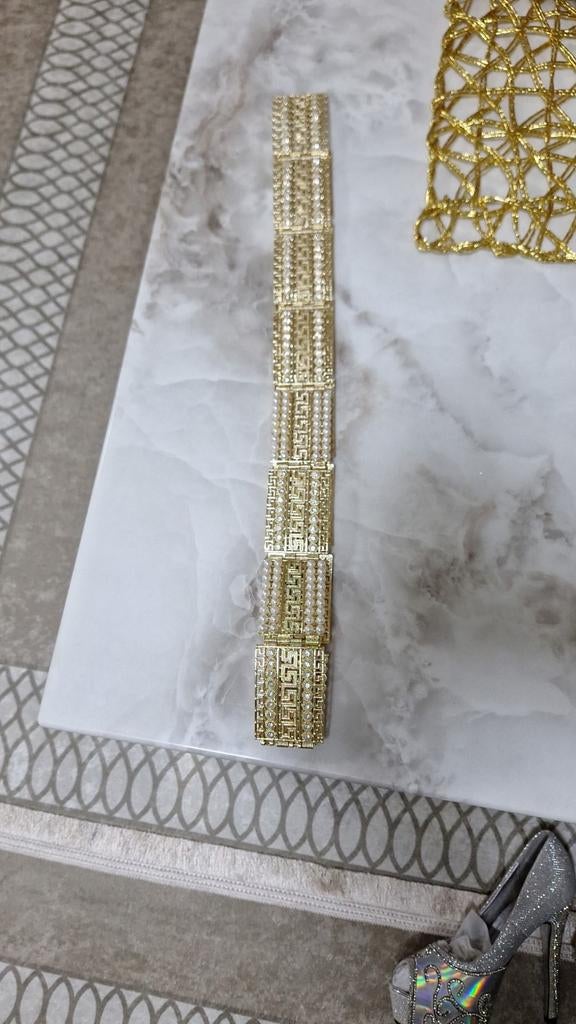 Kolano riem, Ophalen