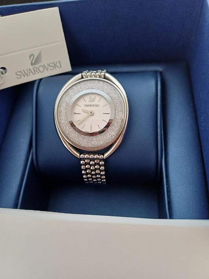 Swarovski Crystalline Aura horloge, Handtassen en Accessoires, Horloges | Dames, Zo goed als nieuw, Ophalen