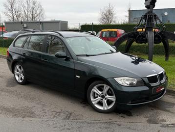 BMW 320i Benzine Touring 110KW // 145.000 Km // 12MGarantie beschikbaar voor biedingen