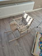 Opgeknapt schommelstoeltje, Ophalen