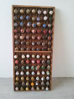 Champagnekurken in letterbak, Enlèvement