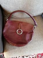 Sac en cuir la selle Roma, Enlèvement