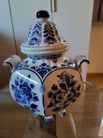 Delfts blauwe dekselvaas, Ophalen