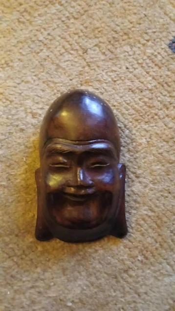 Houten Maskertje Smiling Budha beschikbaar voor biedingen