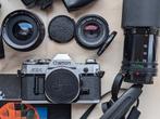 Canon AE-1 met lenzen, volledige set, getest op film met uit, Audio, Tv en Foto, Ophalen of Verzenden, Gebruikt, Canon