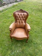 Lederen fauteuil, Ophalen