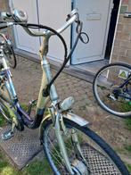 Damesfiets  electric  baterij  a changer, Fietsen en Brommers, Ophalen of Verzenden, Zo goed als nieuw