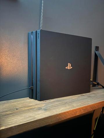 Ps4 Pro + controllers met oplaadstation + 4 games disponible aux enchères