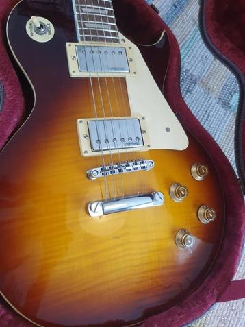 V100 heruitgave Iced Tea Flamed Vintage gitaar beschikbaar voor biedingen