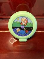 Kid speel reiswekker, Ophalen