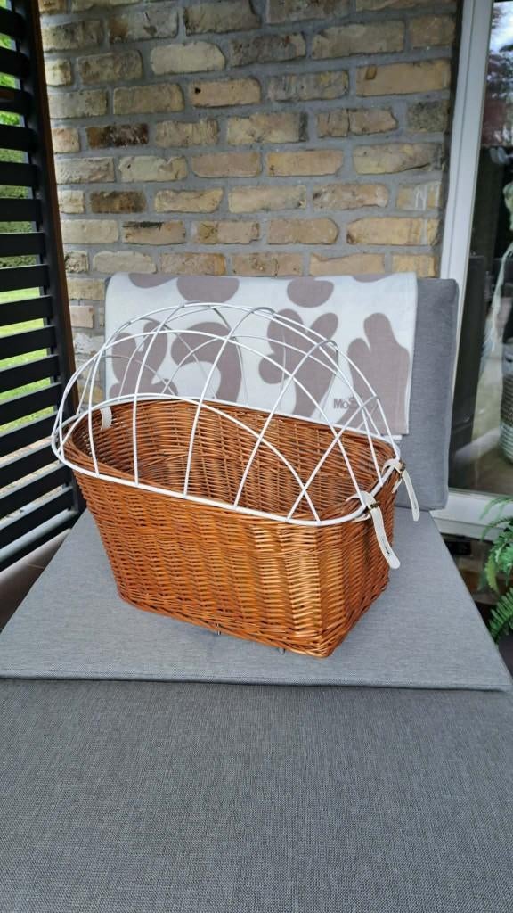 Hondenmand voor op fiets, Ophalen