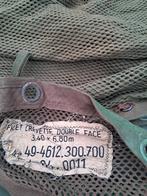 Camouflage net, Ophalen