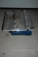 Tegel-zaagmachine, Ophalen