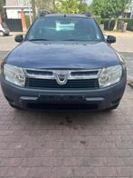 Dacia Duster 1.6i 4x2 – Essence – 03/2011 – 160.000 km, Auto's, Voorwielaandrijving, Euro 5, Stof, Zwart