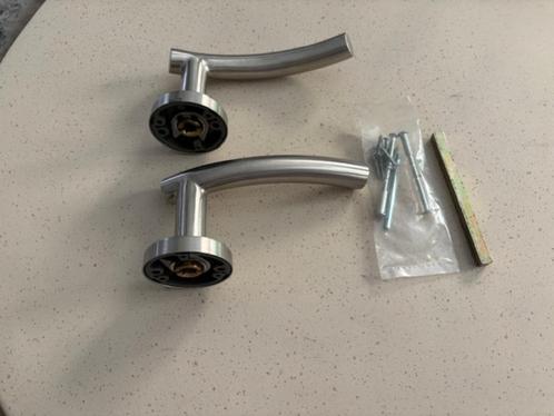 Deurkruk/deurklinkset  Merano RVS-Inox Aktie, Doe-het-zelf en Bouw, Hang- en Sluitwerk, Nieuw, Inox, Ophalen of Verzenden