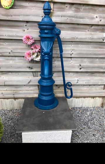 Antieke pomp beschikbaar voor biedingen