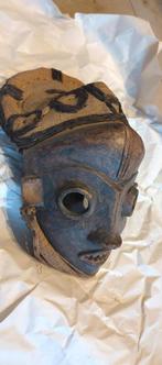 Afrikaans masker, Ophalen