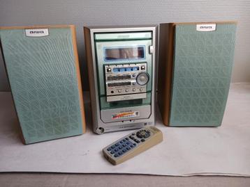 Tuner micro stéréo AIWA à chaîne FM, lecteur CD et cassettes