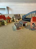 huisjes & winkel & tankstation & brug, Ophalen