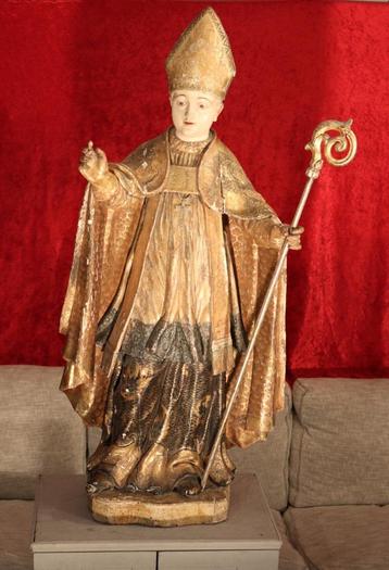 Groot 17e eeuws houten beeld van een bisschop