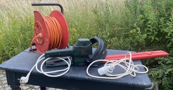 elektrische heggenschaar + verlengsnoer op afwikkelaar beschikbaar voor biedingen