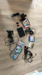 Play Station 2 (PS2) + 7 jeux + micros + buzz, Comme neuf