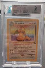 1999 Fossil Dragonite Holo First Edition BGS 9 Gem Mint, Foil, Cartes en vrac, Enlèvement ou Envoi, Neuf