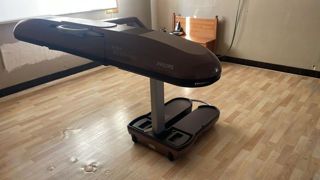 Zonnebank met infrarood, Ophalen