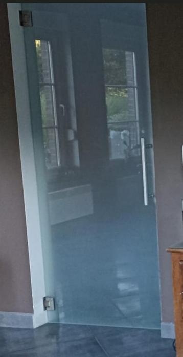 Porte en verre va-et-vient beschikbaar voor biedingen