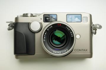 Contax G2 + Carl Zeiss Planar 45 mm f/2 + Flash Contax TLA20 disponible aux enchères